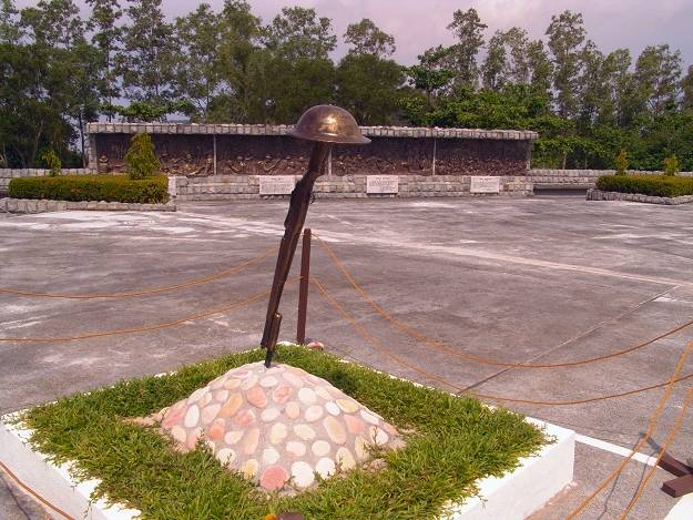 Rifle and helmet, Filipino Heroes Memorial