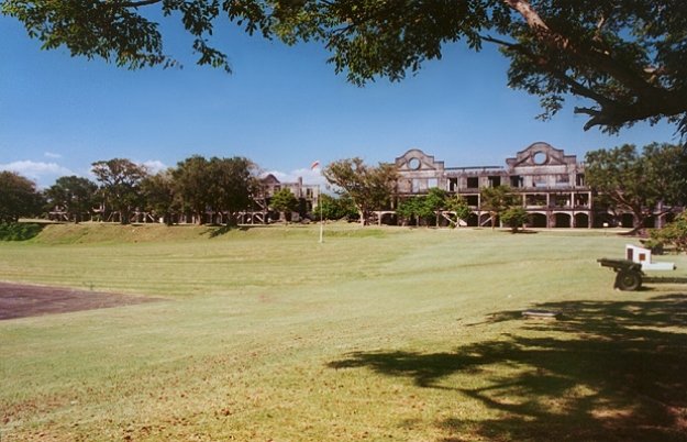 Parade grounds with Milelong Barracks in the background
